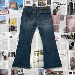 Calvin Klein medium wash mid-rise flare jeans size 30